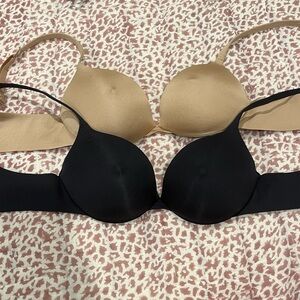 SKIMS Seamless Black and Tan nipple bra pack
